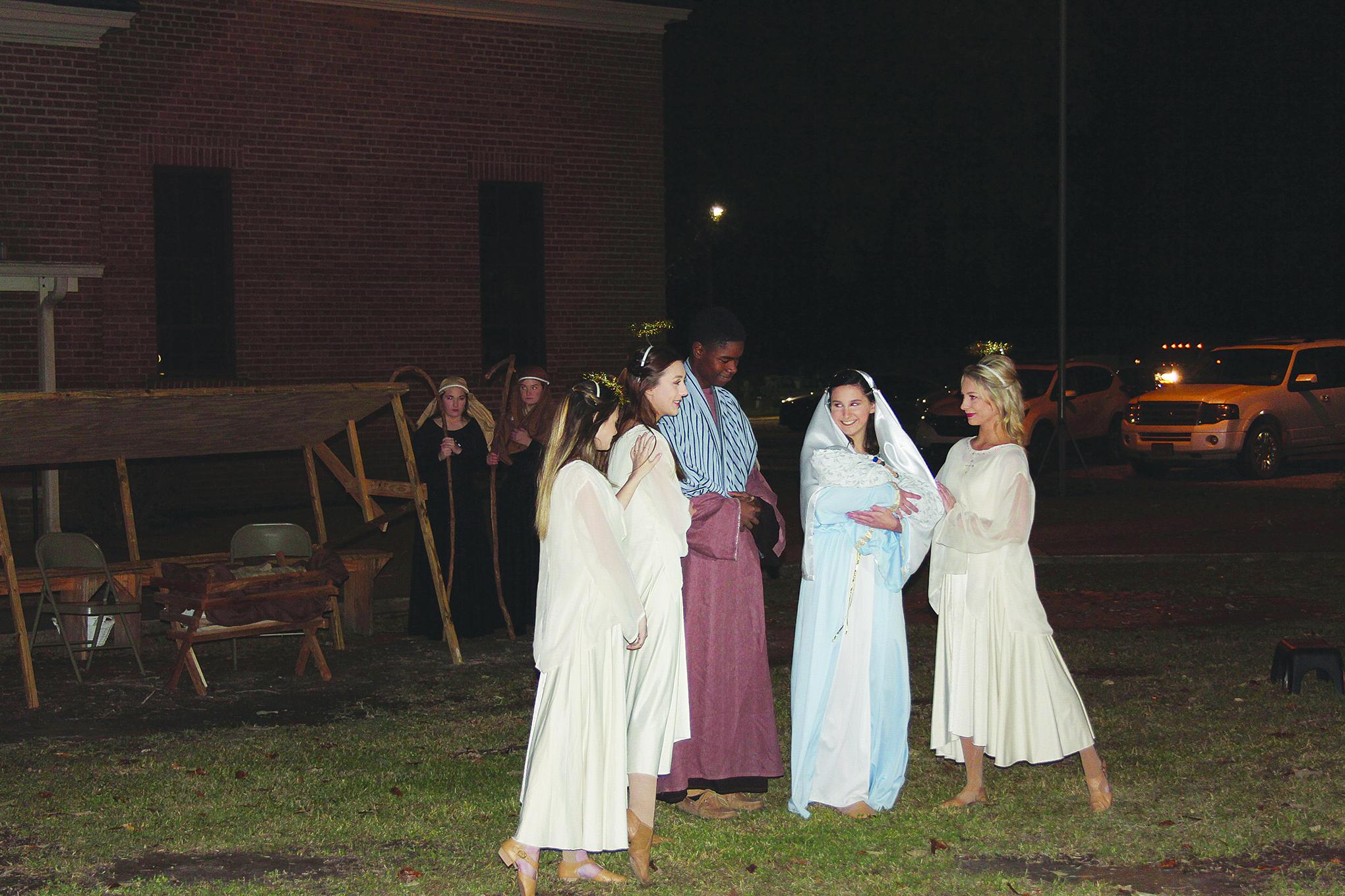 Sacred Heart celebrates Christmas Under the Oaks Evangeline Today